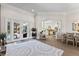 Open-concept space with living, kitchen and dining areas featuring wood floors at 2152 Majestic Oaks Blvd, Clearwater, FL 33759