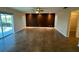 Spacious living room with tile floors, ceiling fan, accent wall and recessed lighting at 2178 Calcutta Rd, Punta Gorda, FL 33983
