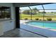 View from lanai overlooking the beautiful pool and backyard at 2178 Calcutta Rd, Punta Gorda, FL 33983