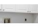 Utility room with hookups for washer and dryer at 251 Broadmoor Ln, Rotonda West, FL 33947