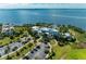 Aerial view of community center, waterfront, and ample parking at 276 Saint Lucia Dr # 101, Bradenton, FL 34209