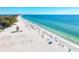 A pristine beach offers sun-kissed sands and inviting turquoise waters at 276 Saint Lucia Dr # 101, Bradenton, FL 34209