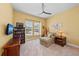 Spare bedroom providing a chair and a view out the window at 276 Saint Lucia Dr # 101, Bradenton, FL 34209