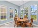 The dining room offers water views through the home's ample windows at 276 Saint Lucia Dr # 101, Bradenton, FL 34209