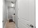 Convenient laundry room boasts modern appliances and neutral gray walls at 276 Saint Lucia Dr # 101, Bradenton, FL 34209