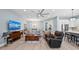 Spacious living room with tile floors, modern lighting, and comfortable seating at 276 Saint Lucia Dr # 101, Bradenton, FL 34209
