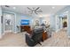 Bright and open living room featuring tile floors, a ceiling fan, and plenty of space to relax at 276 Saint Lucia Dr # 101, Bradenton, FL 34209