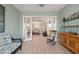 The airy living room is bright with natural light at 276 Saint Lucia Dr # 101, Bradenton, FL 34209