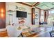 Community lounge area with decor and wall art. TV and sitting area at 276 Saint Lucia Dr # 101, Bradenton, FL 34209