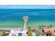 A vibrant pier extends into turquoise waters, inviting exploration and seaside enjoyment at 276 Saint Lucia Dr # 101, Bradenton, FL 34209