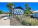 Community entrance with charming signage and lush landscaping, creating a welcoming and attractive neighborhood at 276 Saint Lucia Dr # 101, Bradenton, FL 34209
