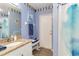 Charming bathroom featuring a granite vanity and a nautical-themed decor at 2801 Dalhart Ave, North Port, FL 34286