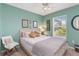 Bright bedroom with soothing light-green walls and comfortable furnishings at 2801 Dalhart Ave, North Port, FL 34286