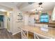 Bright and airy kitchen featuring an island and stainless steel appliances at 2801 Dalhart Ave, North Port, FL 34286