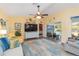Cozy living room with comfortable seating and bright lighting, perfect for relaxation at 2801 Dalhart Ave, North Port, FL 34286