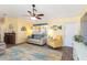 Comfortable living room with ample seating and bright, sunlit windows at 2801 Dalhart Ave, North Port, FL 34286