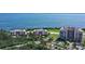 Breathtaking aerial view of the condo complex, golf course and beautiful bay at 3070 Grand Bay Blvd # 644, Longboat Key, FL 34228
