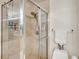 Bright bathroom features glass enclosed shower at 3070 Grand Bay Blvd # 644, Longboat Key, FL 34228