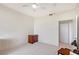 Neutral bedroom with light carpet, ceiling fan, and minimal furniture providing a calm and relaxing space at 3070 Grand Bay Blvd # 644, Longboat Key, FL 34228