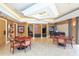 Comfortable common area featuring tables, chairs, and a piano, perfect for gatherings at 3070 Grand Bay Blvd # 644, Longboat Key, FL 34228