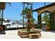 Picturesque courtyard with a tiered fountain and views of the marina, ideal for relaxing at 3070 Grand Bay Blvd # 644, Longboat Key, FL 34228
