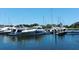 Beautiful marina view showcasing luxury yachts docked in the calm, clear blue waters at 3070 Grand Bay Blvd # 644, Longboat Key, FL 34228