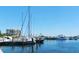 View of the marina with numerous yachts docked, reflecting the upscale waterfront lifestyle at 3070 Grand Bay Blvd # 644, Longboat Key, FL 34228