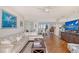 Bright living room featuring a comfortable sofa, stylish decor, and plenty of natural light at 3070 Grand Bay Blvd # 644, Longboat Key, FL 34228