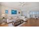 Bright living room featuring a comfortable sofa, stylish decor, and plenty of natural light at 3070 Grand Bay Blvd # 644, Longboat Key, FL 34228