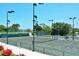 Outdoor tennis court at Longboat Key Club & Resort featuring well-maintained surface and lighting at 3070 Grand Bay Blvd # 644, Longboat Key, FL 34228