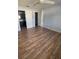 Spacious bedroom with hardwood floors, ceiling fan, and neutral walls at 3231 Cambridge Dr, Sarasota, FL 34232