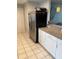 Bright kitchen with granite countertops, stainless steel appliances, and white cabinets at 3231 Cambridge Dr, Sarasota, FL 34232