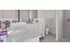 Clean, bright bathroom with a white vanity, toilet, and a walk-in shower at 3620 Como St, Port Charlotte, FL 33948