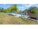 The dock area offers beautiful views of the water and has a cozy seating area at 3620 Como St, Port Charlotte, FL 33948