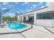 Lovely screened pool and extended patio, perfect for outdoor entertaining and relaxation at 3620 Como St, Port Charlotte, FL 33948