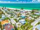 Coastal neighborhood featuring lush greenery, pristine beaches, and turquoise waters at 3702 5Th Ave, Holmes Beach, FL 34217