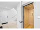 Modern elevator with wood paneling and adjacent staircase for easy access to all levels at 3702 5Th Ave, Holmes Beach, FL 34217