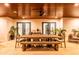 Outdoor dining area featuring a large wooden table and chairs, great for Gathering gatherings at 3702 5Th Ave, Holmes Beach, FL 34217