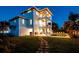 Three story home with balconies, outdoor kitchen, in-ground pool and backyard at 3702 5Th Ave, Holmes Beach, FL 34217