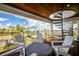 Inviting rooftop deck with a spiral staircase and comfortable seating, perfect for enjoying panoramic views at 3702 5Th Ave, Holmes Beach, FL 34217