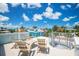 Stunning rooftop deck perfect for entertaining with comfortable seating and amazing water views at 3702 5Th Ave, Holmes Beach, FL 34217