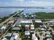 Beautiful aerial view of this beach community near the bay and other neighborhood amenities at 3703 5Th Ave # 3, Holmes Beach, FL 34217
