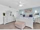 Serene bedroom with coastal-themed decor, white furniture, and a spacious layout at 3703 5Th Ave # 3, Holmes Beach, FL 34217