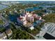 Aerial shot of a grand hotel and resort featuring a beachside pool and various outdoor activities at 3800 Gulf Blvd # Ph, St Petersburg, FL 33706