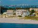 Scenic beach view of beachfront properties with Gulf views, perfect for those seeking a coastal lifestyle at 3800 Gulf Blvd # Ph, St Petersburg, FL 33706