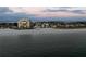 Stunning aerial view of the beach and waterfront buildings, offering a glimpse of the coastal lifestyle at 3800 Gulf Blvd # Ph, St Petersburg, FL 33706