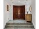 Grand entrance featuring marble floors, elegant double doors, and classic design at 3800 Gulf Blvd # Ph, St Petersburg, FL 33706