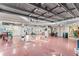 A huge garage provides ample space for parking and storage with multiple work benches and shelving at 3800 Gulf Blvd # Ph, St Petersburg, FL 33706