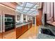 This spacious kitchen features stainless steel appliances, granite countertops, and custom cabinetry at 3800 Gulf Blvd # Ph, St Petersburg, FL 33706