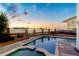 This beautiful pool area has a spa and seating area and features views of the beach and water at 3800 Gulf Blvd # Ph, St Petersburg, FL 33706